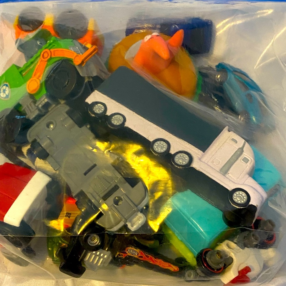 Bag full of odds and ends little toys good shape